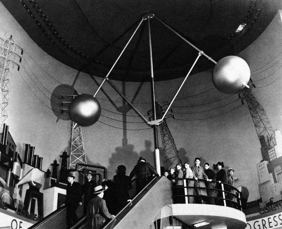 In this May 8, 1939 photo provided by Westinghouse, vistors ascend the "electric stairway" in the Hall of Power at the Westinghouse Building at the World’s Fair in New York. (AP Photo/Westinghouse)