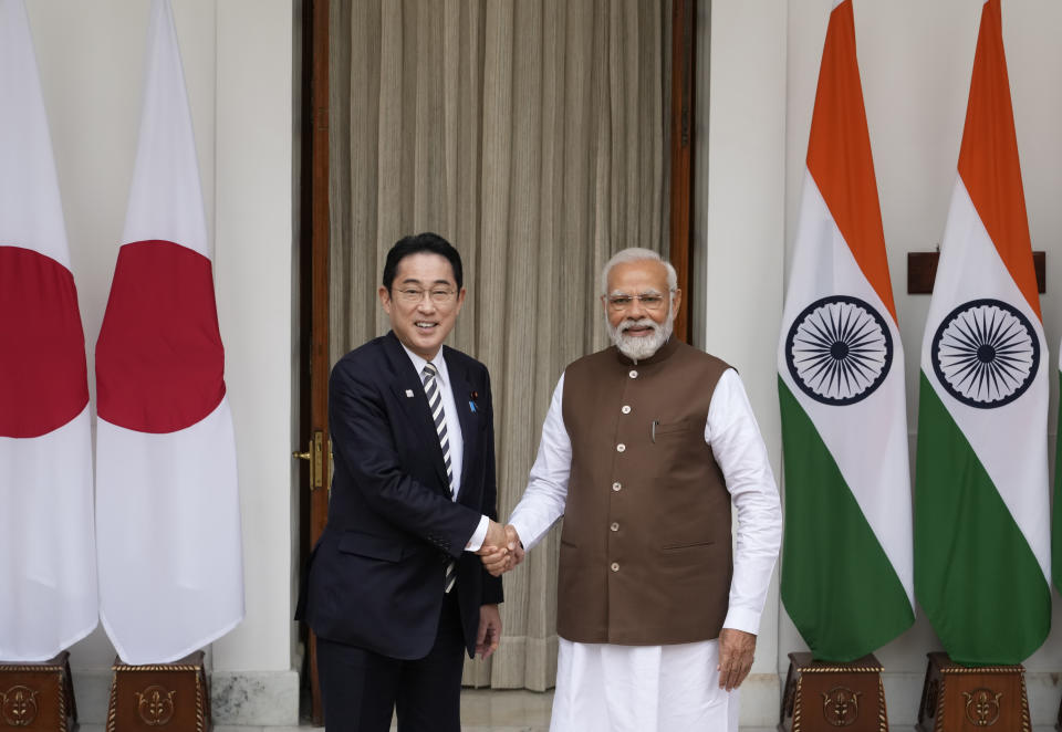 Japan's Prime Minister Fumio Kishida, left and Indian Prime Minister Narendra Modi, pose for the media before their delegation level meeting in New Delhi, India, Monday, March 20, 2023. India and Japan explored collaboration in critical and emerging technologies, including semiconductors and resilient supply chains, as part of a target of $35.91 billion Japanese investment in the country by 2027, officials said on Friday. (AP Photo/Manish Swarup, file)