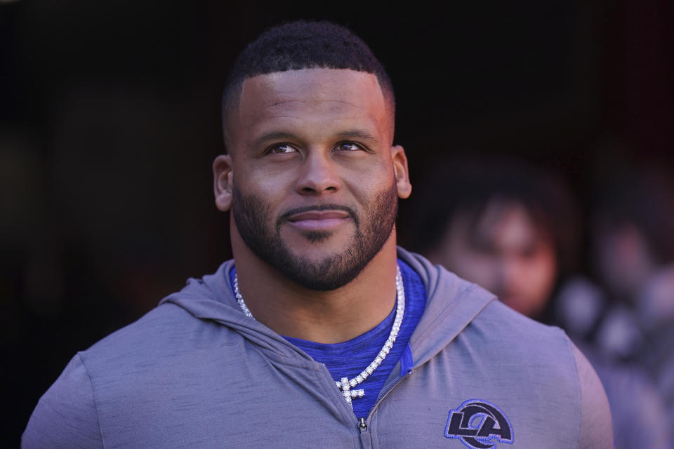 FILE - Los Angeles Rams defensive tackle Aaron Donald walks out of a tunnel before an NFL football game against the San Francisco 49ers in Santa Clara, Calif., Sunday, Jan. 7, 2024. Defensive lineman Aaron Donald has announced his retirement after a standout 10-year career with the Los Angeles Rams. The three-time AP NFL Defensive Player of the Year made his surprising announcement on social media Friday, March 15, 2024. (AP Photo/Loren Elliott, File)