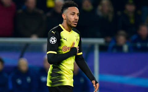 Dortmund's Gabonese forward Pierre-Emerick Aubameyang celebrating scoring the opening goal during the UEFA Champions League Group H football match BVB Borussia Dortmund v Tottenham Hotspur at the BVB Stadion in Dortmund - Credit: JOHN MACDOUGALL/AFP/Getty Images