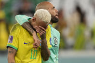 Brazil's Neymar reacts after the penalty shootout besides Brazil's goalkeeper Ederson at the World Cup quarterfinal soccer match between Croatia and Brazil, at the Education City Stadium in Al Rayyan, Qatar, Friday, Dec. 9, 2022. (AP Photo/Martin Meissner)