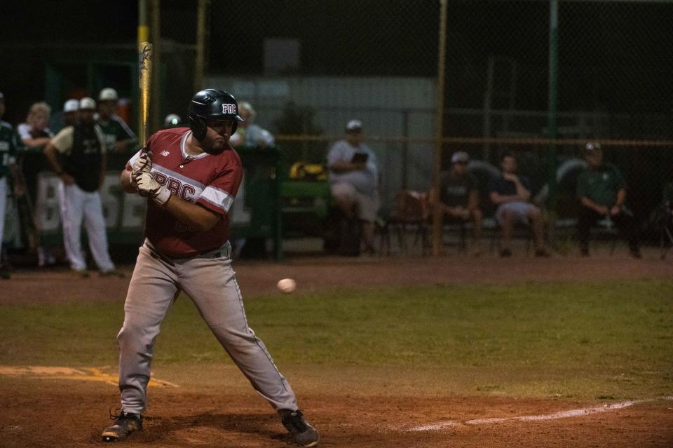 Palm Beach Central first baseman Kyle Baxt (23) is hit by a pitch at the top of the fifth inning during the District 11-7A championship baseball game between host Jupiter and Palm Beach Central on Thursday, May 4, 2023, in Jupiter, Fla. Final score, Jupiter, 11, Palm Beach Central, 3.