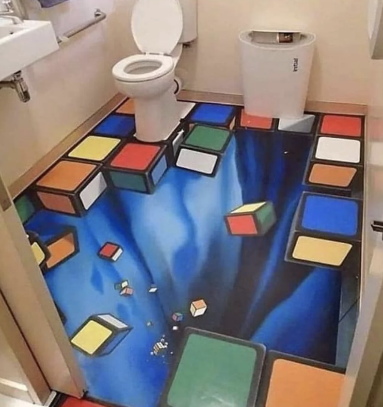 A bathroom with Rubik's cube floors