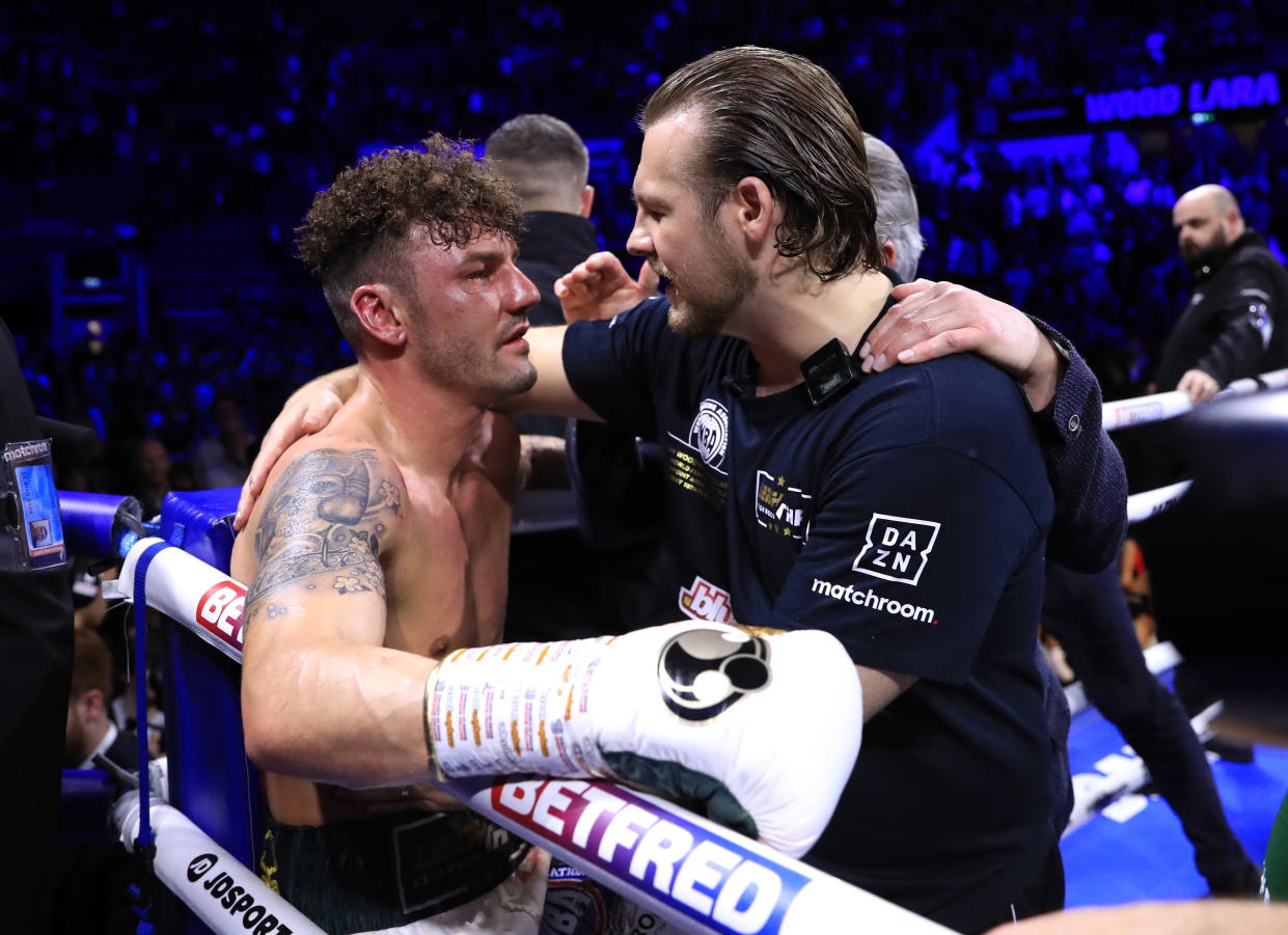 Leigh Wood with coach Ben Davison after defeat to Mauricio Lara after their WBA Featherweight World Title contest at the Motorpoint Arena, Nottingham. Picture date: Saturday February 18, 2023. (Photo by Bradley Collyer/PA Images via Getty Images)