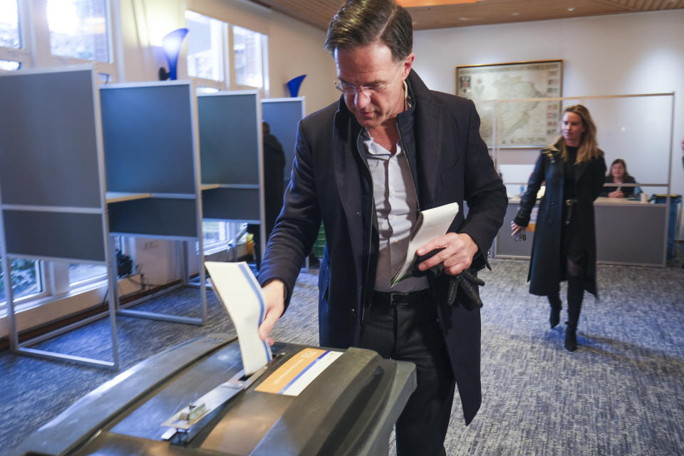 Dutch Prime Minister Mark Rutte casts his ballot for the provincial elections in The Hague, Netherlands, Wednesday, March 15, 2023. Local elections with national consequences opened Wednesday in the Netherlands as voters cast their ballots for the country's 12 provincial legislatures, which in turn elect the national parliament's upper house. (AP Photo/Mike Corder)