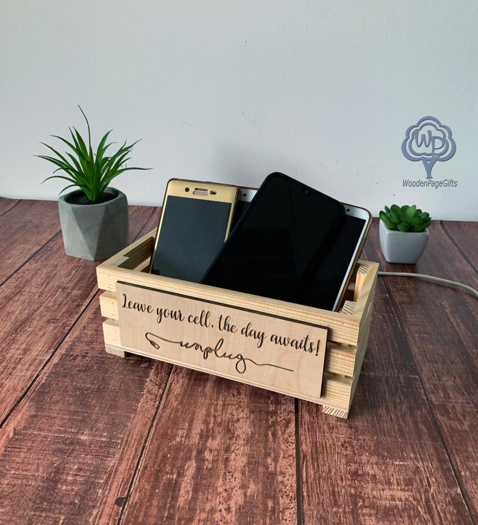 Encourage your friends to unplug and pay attention to each other instead of their phones with this handy device catch-all box.&nbsp;<strong><a href="https://www.etsy.com/listing/735619637/cell-phone-box-unplug-box-rustic-wood?ga_order=most_relevant&amp;ga_search_type=all&amp;ga_view_type=gallery&amp;ga_search_query=Unplug+Box&amp;ref=sr_gallery-1-8&amp;organic_search_click=1&amp;pro=1" target="_blank" rel="noopener noreferrer">Get this unplug box for $26</a>.</strong>