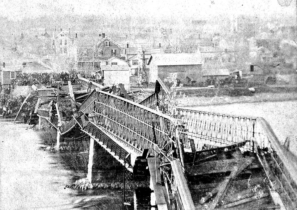 This photo provided by Lee County Historical and Genealogical Society shows the Truesdell Bridge in Dixon, Ill., in 1873. It's been 150 years since the bridge collapsed, remaining the worst road-bridge disaster in American history. On May 4, 1873, a crowd of more than 200 gathered on the bridge to watch a baptism when it toppled over, trapping dozens of victims just inches below the river's surface. The disaster claimed 46 lives and injured dozens of others. (Charles Keyes/Lee County Historical and Genealogical Society via AP)