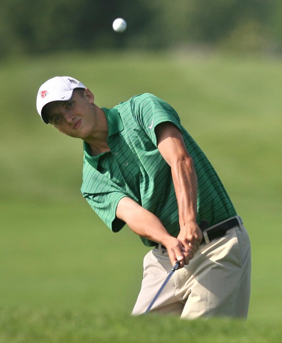 FILE -- Yorktown's Joe Gasser chips to the #3 green during the regional golf meet at The Players Club.