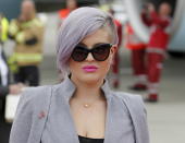 TV personality Kelly Osbourne poses upon her arrival for the Life Ball at the airport in Vienna, Austria, May 15, 2015. Life Ball is Europe's largest annual AIDS charity event and takes place at the Vienna city hall on May 16, 2015. REUTERS/Leonhard Foeger