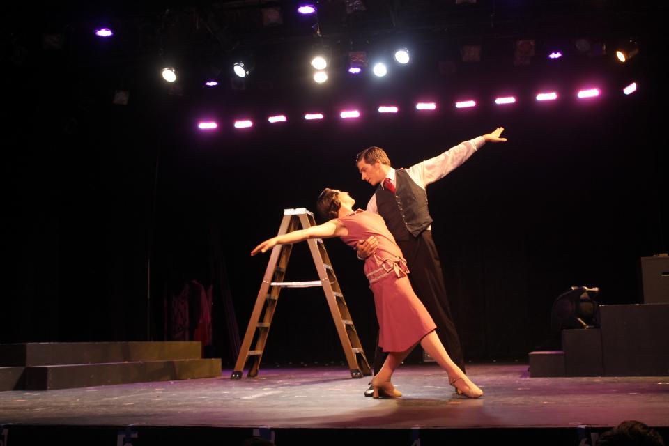 Kylee Brown (Kathy Seldon) and Sam Joseph (Don Lockwood) dance during the College Light Opera Company's production of "Singin' in the Rain."