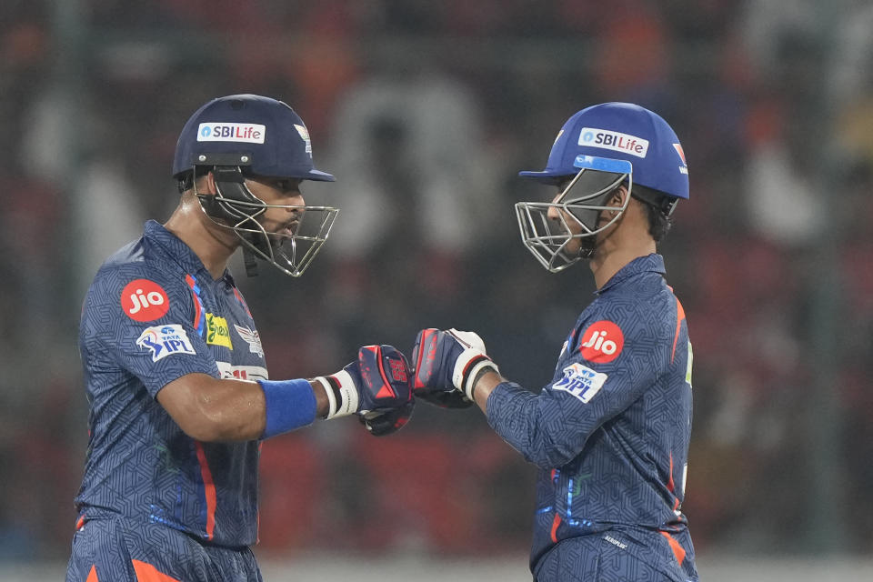 Lucknow Super Giants' Nicholas Pooran, left, and Ayush Badon encourage each other during the Indian Premier League cricket match between Sunrisers Hyderabad and Lucknow Super Giants in Hyderabad, India, Wednesday, May 8, 2024. (AP Photo/Mahesh Kumar A.)