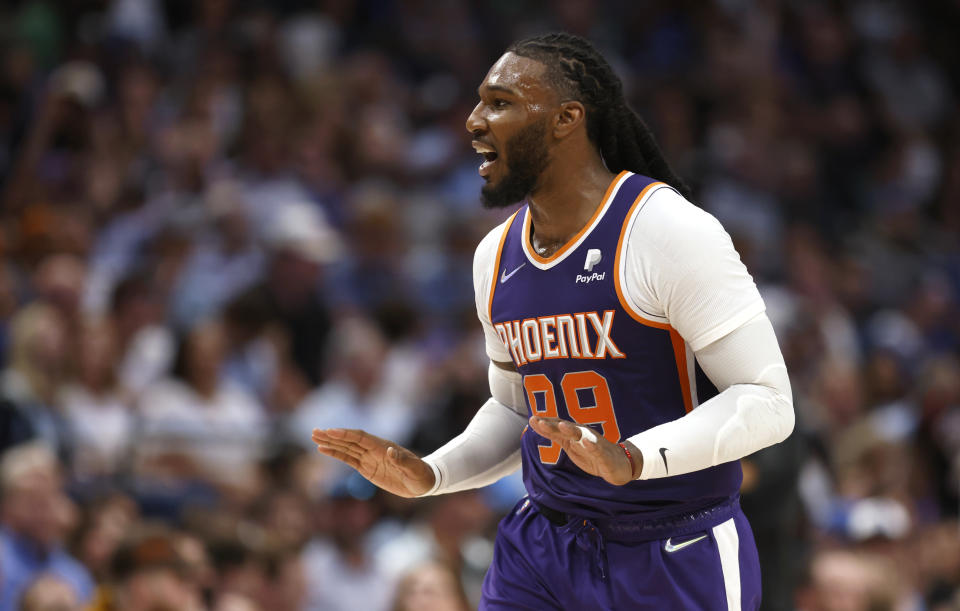 DALLAS, TX - MAY 6: Jae Crowder #99 of the Phoenix Suns reacts toward the Mavericks bench after scoring with a three point shot during the second half of Game Three of the 2022 NBA Playoffs Western Conference Semifinals at American Airlines Center on May 6, 2022 in Dallas, Texas. NOTE TO USER: User expressly acknowledges and agrees that, by downloading and or using this photograph, User is consenting to the terms and conditions of the Getty Images License Agreement. (Photo by Ron Jenkins/Getty Images)