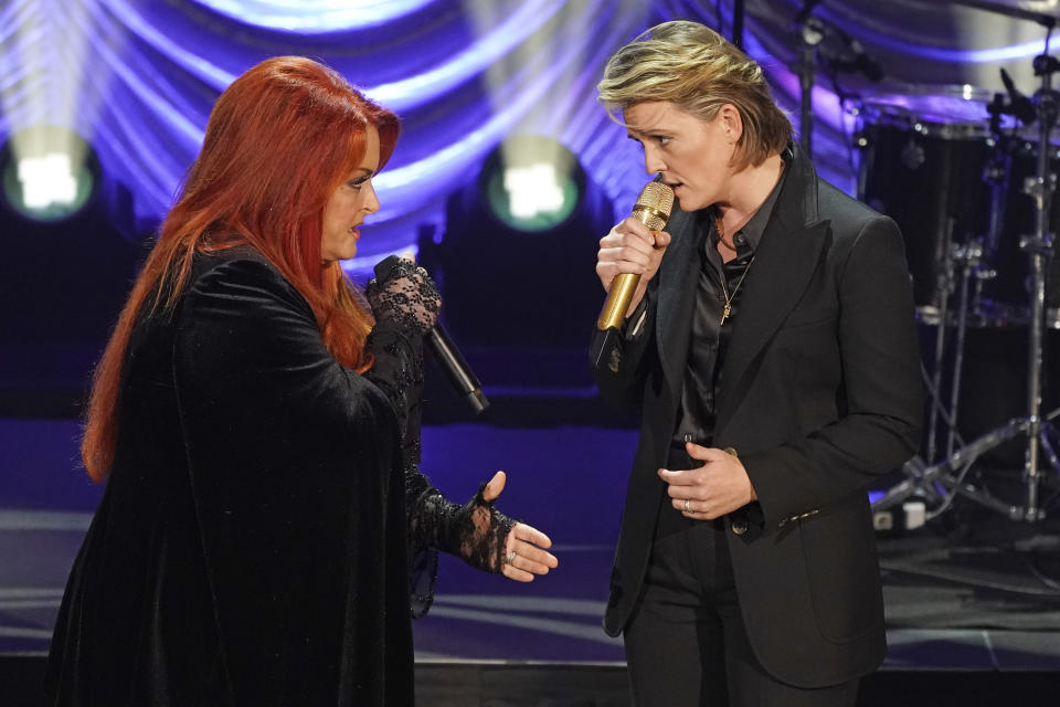 Wynonna Judd, left, and Brandi Carlile sing "The Rose" during a tribute to country music star Naomi Judd Sunday, May 15, 2022, in Nashville, Tenn. Naomi Judd died April 30. She was 76. (AP Photo/Mark Humphrey)