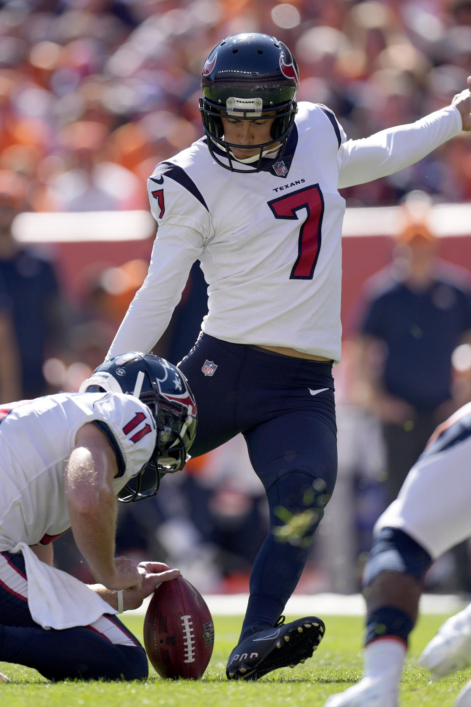 Houston Texans place kicker Ka'imi Fairbairn (7) kicks a field goal against the Denver Broncos during the first half of an NFL football game, Sunday, Sept. 18, 2022, in Denver. (AP Photo/David Zalubowski)