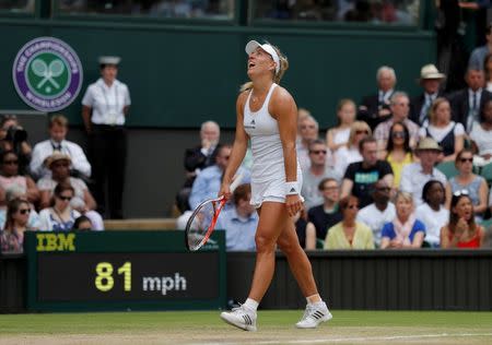 Britain Tennis - Wimbledon - All England Lawn Tennis & Croquet Club, Wimbledon, England - 9/7/16 Germany's Angelique Kerber reacts againstUSA's Serena Williams in the womens singles final REUTERS/Andrew Couldridge