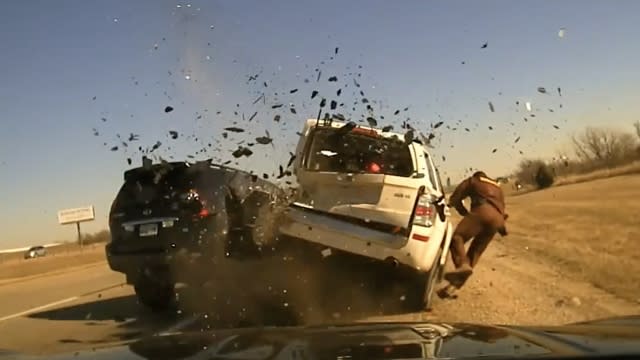 Trooper Jesse Gregory leaps out of the way of a vehicle collision.