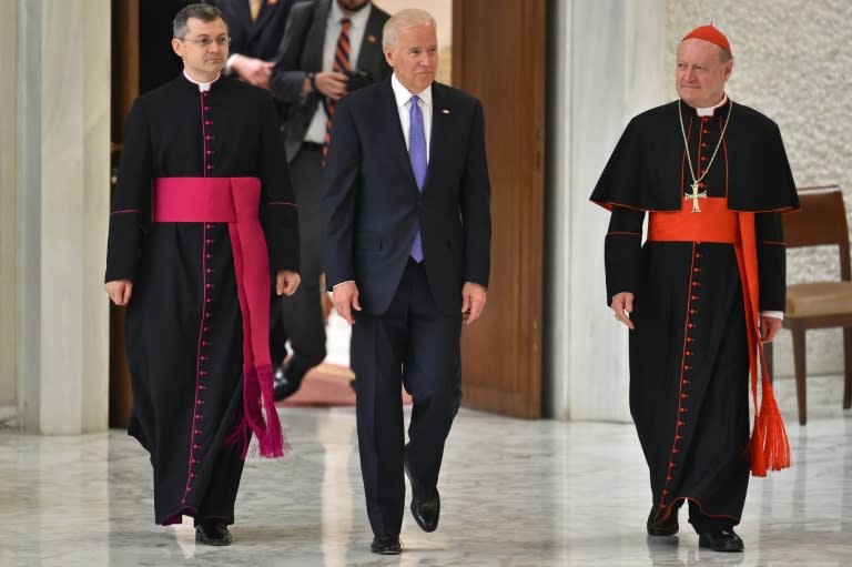 US Vice President Joe Biden (C) arrives to deliver a speech at a stem cell summit, on April 29, 2016 at the Vatican