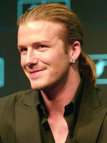 Sandra Behne/Bongarts/Getty David Beckham at a press conference in 2004.