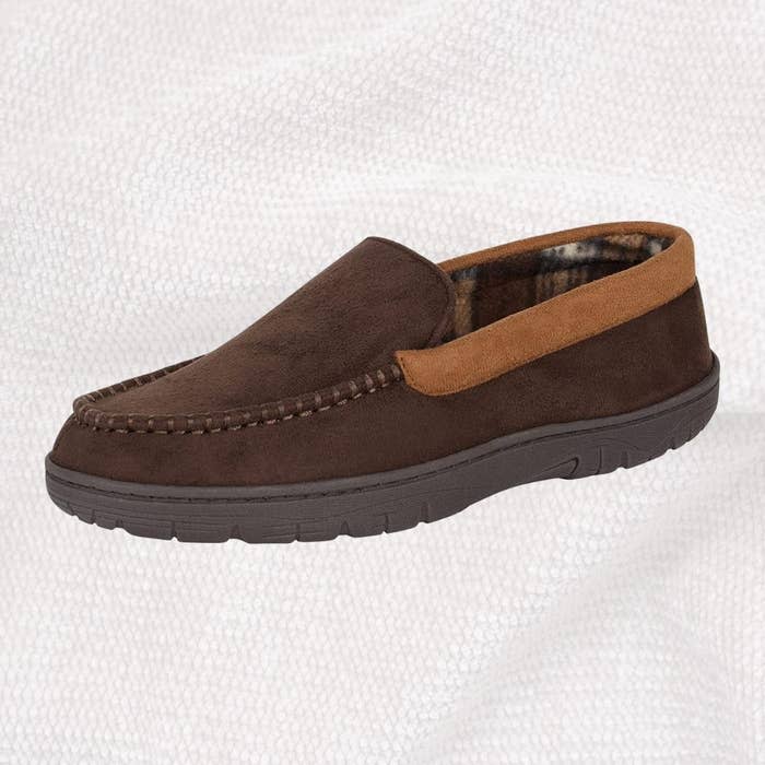 Amazon rating: 4.3 out of 5 starsYour feet will feel amazing in these moccasin-style slippers, which have thick memory foam cushioning on the inside and a grippy sole to prevent slipping. They come in men's sizes S-3XL (6.5-15) and in a variety of colors, including brown, black, tan, burgundy and gray. Promising review: 