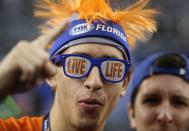 A Florida fan reacts before an NCAA Final Four tournament college basketball semifinal game against Connecticut, Saturday, April 5, 2014, in Arlington, Texas. (AP Photo/David J. Phillip)