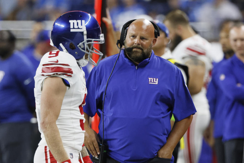 New York Giants head coach Brian Daboll looks towards New York Giants wide receiver Cole Beasley during the first half of an NFL preseason football game against the Detroit Lions, Friday, Aug. 11, 2023, in Detroit. (AP Photo/Duane Burleson)