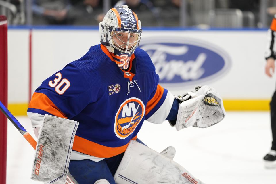 New York Islanders goaltender Ilya Sorokin (30) protects his net during the first period of an NHL hockey game against the New Jersey Devils Monday, March 27, 2023, in Elmont, N.Y. (AP Photo/Frank Franklin II)