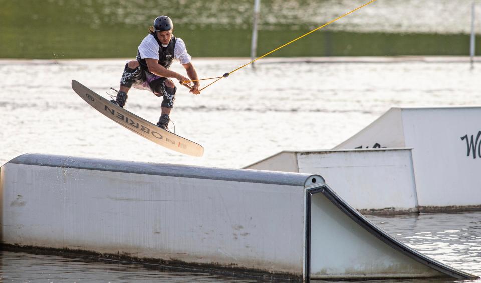 Dary Znebel competes in a wakeboarding competition Saturday, June 18, 2022, at West Rock Wake Park at Levings Lake in west Rockford.