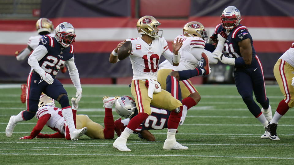 San Francisco 49ers quarterback Jimmy Garoppolo passes against the New England Patriots in the first half of an NFL football game, Sunday, Oct. 25, 2020, in Foxborough, Mass. (AP Photo/Steven Senne)