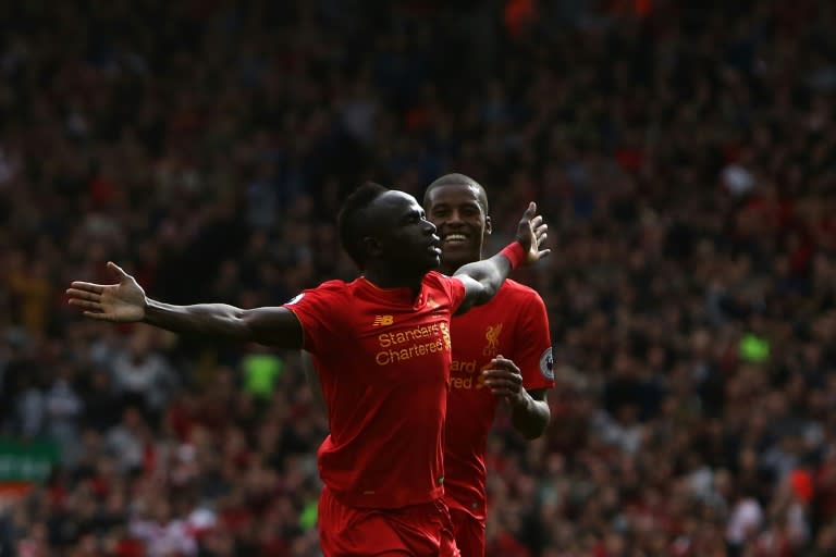 Sadio Mane celebrates scoring Liverpool's third goal during their Hull City clash