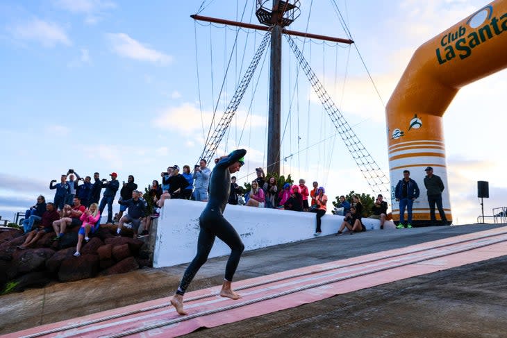 <span class="article__caption">Justus Nieschlag exists the water first on his way to a wire-to-wire victory at Ironman 70.3 Lanzarote.</span> (Photo: Ryan Sosna-Bowd/ Getty Images)