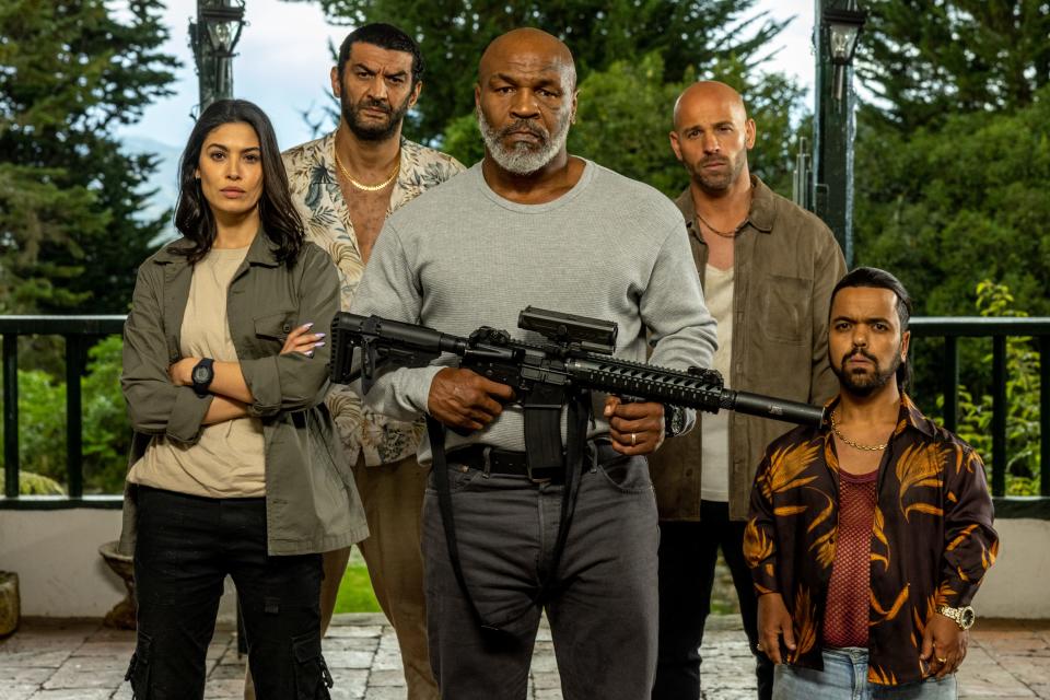 Mike Tyson (center) stars as a former special forces operative who gets a motley crew (Essined Aponte, Ramzy Bedia, Franck Gastambide and Anouar Toubali) ready to take on a Colombian drug cartel in the French action comedy "Medellín."