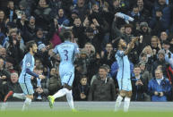 <p>Manchester City’s Raheem Sterling, right, celebrates after scoring during the English Premier League soccer match between Manchester City and Arsenal at the Etihad Stadium in Manchester, England, Sunday, Dec. 18, 2016. (AP Photo/Rui Vieira) </p>