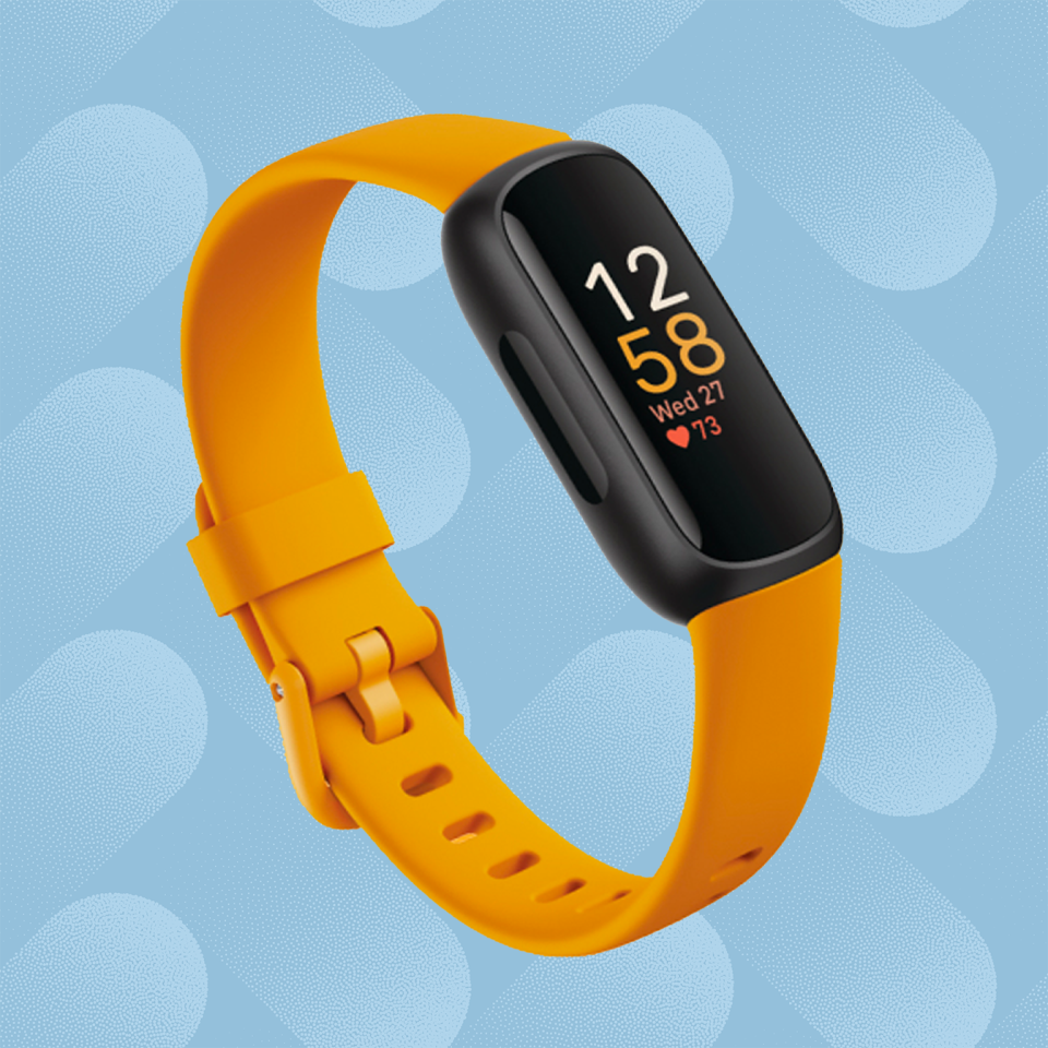 the fitbit inspire 3 with orange band