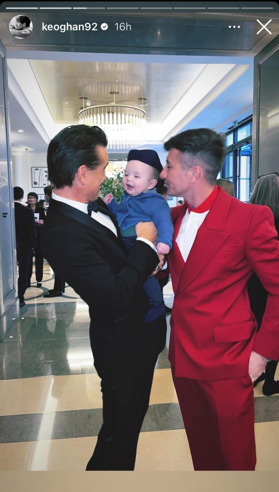 Colin Farrell (left) and Barry Keoghan look at Keoghan’s baby son Brando as he laughs (Instagram/Barry Keoghan)