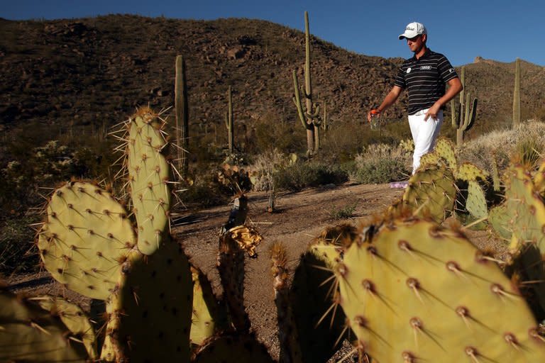 Webb Simpson walks between holes during the quarter-final of the WGC Match Play Championship on February 23, 2013. Hunter Mahan came out on top in a tense duel with Simpson