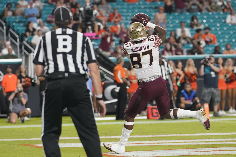 Florida State tight end Camren McDonald (87) scores a touchdown during the second half of an NCAA college football game against Miami, Saturday, Nov. 5, 2022, in Miami Gardens, Fla.(AP Photo/Lynne Sladky)