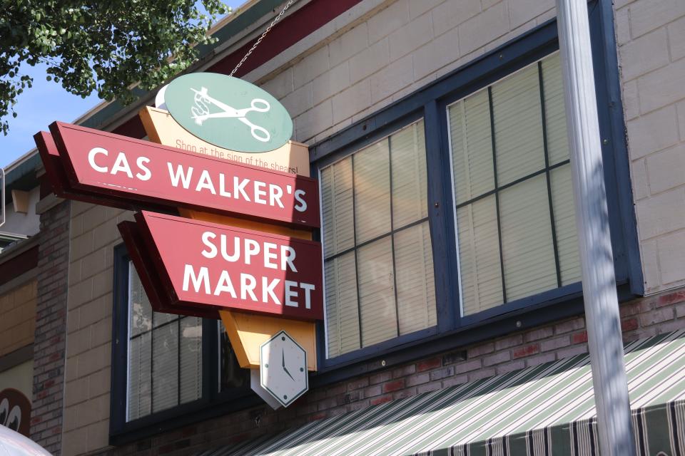 A sign for Cas Walker's Super Market storefront at Dollywood theme park in Tennessee.