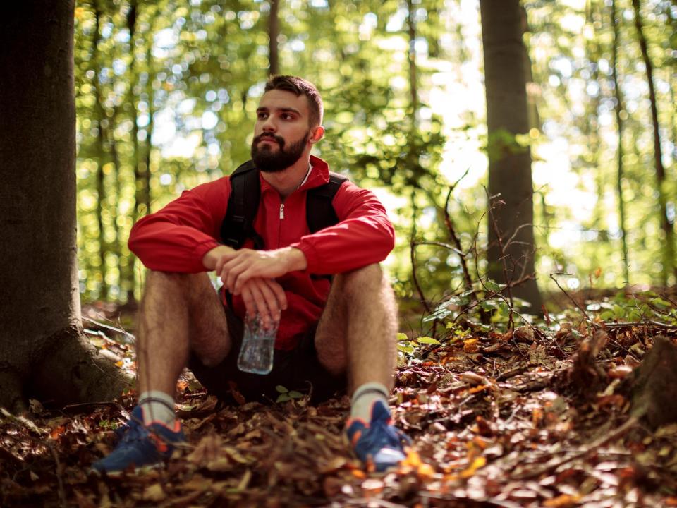 Man sitting in woods