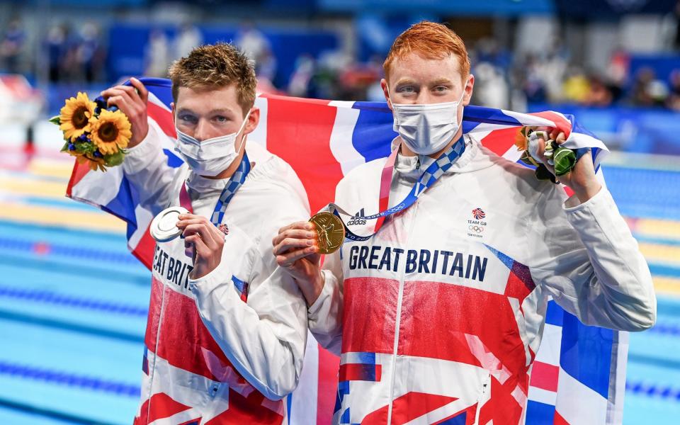 Team GB, Britain's Tom Dean claimed a stunning gold ahead of team-mate Duncan Scott in a thrilling 200m freestyle - Tokyo gold rush sees Team GB enjoy best start to an Olympics in modern history - PAUL GROVER FOR THE TELEGRAPH