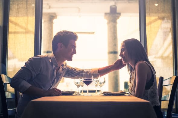 Affectionate couple at restaurant