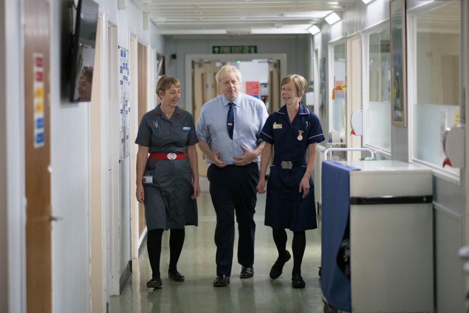 Prime Minister Boris Johnson meets staff during a visit to The Princess Alexandra hospital in Harlow, Essex for an announcement on new patient scanning equipment. PA Photo. Picture date: Friday September 27, 2019. The Prime Minister is pledging an overhaul to cancer screening, with the funding providing 300 diagnostic machines in hospitals across England. See PA story POLITICS Brexit. Photo credit should read: Stefan Rousseau/PA Wire