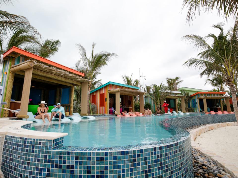 people in cabanas by the pool at Royal Caribbean Perfect Day at CocoCay's Hideaway Beach