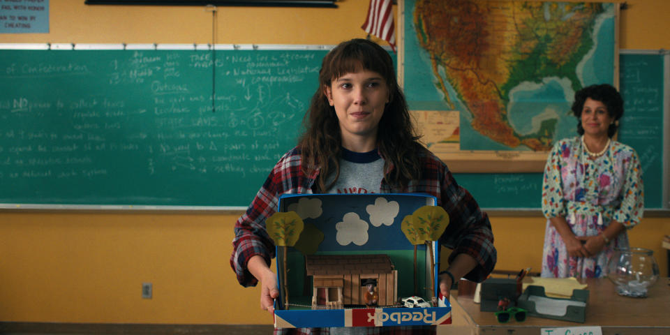 Eleven gives a presentation in her class in Lenora, Ca - Credit: Courtesy of Netflix