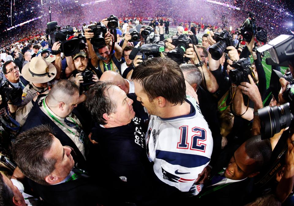 GLENDALE, AZ - FEBRUARY 01:  Tom Brady #12 of the New England Patriots celebrates with head coach Bill Belichick after defeating the Seattle Seahawks 28-24 during Super Bowl XLIX at University of Phoenix Stadium on February 1, 2015 in Glendale, Arizona.  (Photo by Christian Petersen/Getty Images)