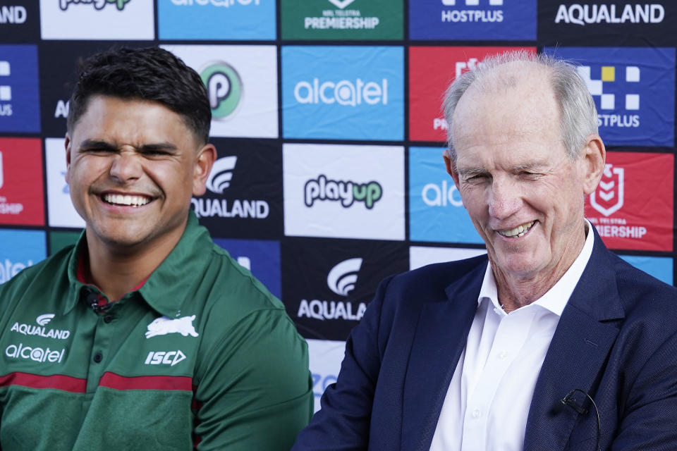 Latrell Mitchell and Wayne Bennett react.