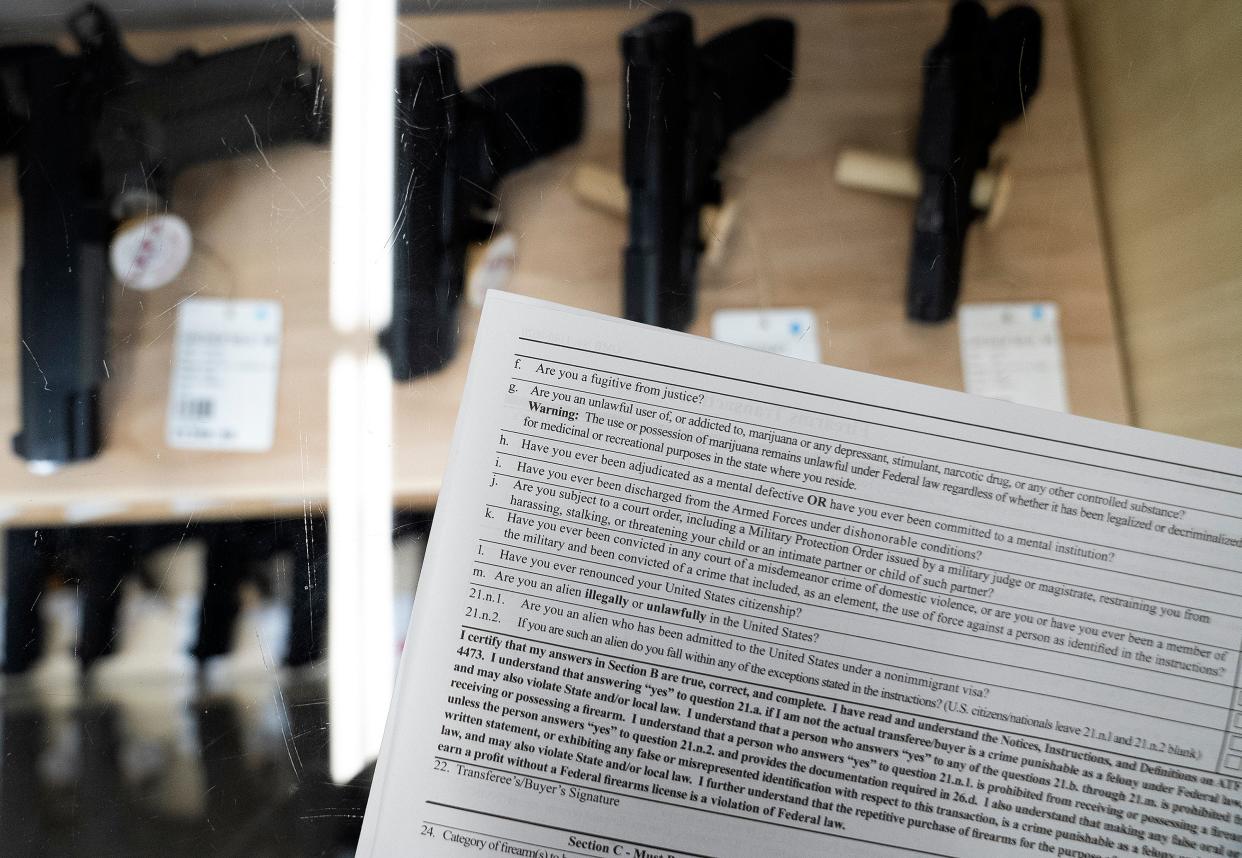 Oct 24, 2023; columbus, ohio, usa; A form that is required by anyone purchaing a firearm rests on a counter at L.E.P.D. Firearms, Range & Training Facility.