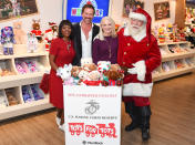 <p>In celebration of Hallmark Channel's new movie <em>Christmas CEO,</em> airing Nov. 26 at 6 p.m. ET, Crown Media president and CEO Wonya Lucas, actor Paul Greene and Build-A-Bear Workshop president and CEO Sharon Price John greet Santa at an L.A. Build-A-Bear Workshop, with a special donation for Toys for Tots.</p>