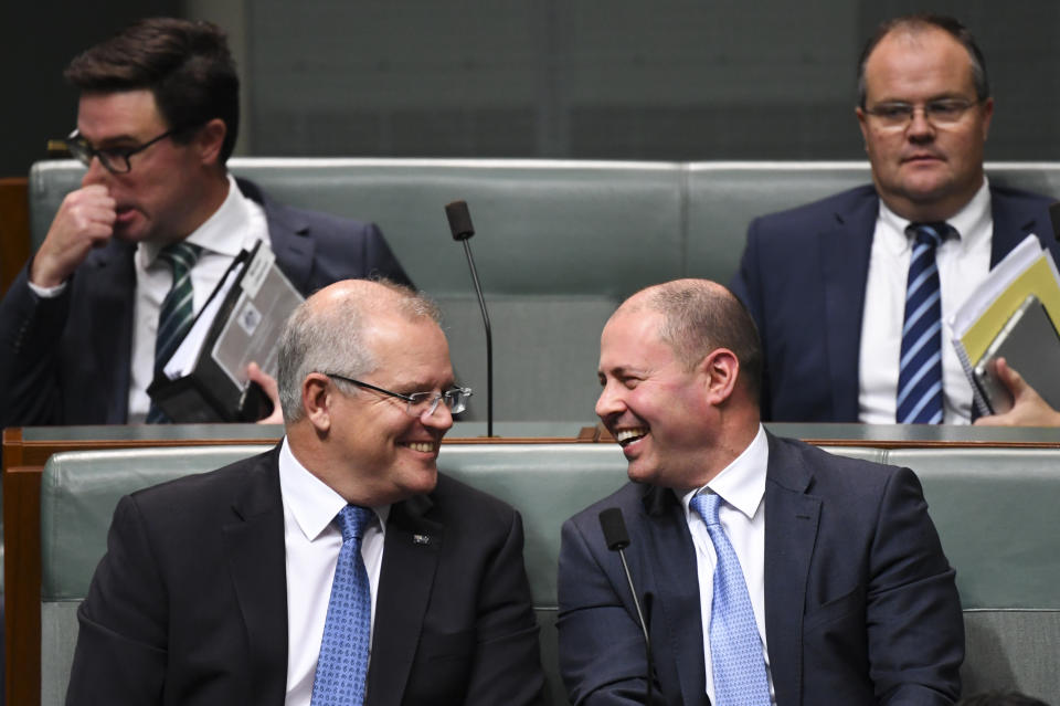 Australian Prime Minister Scott Morrison (left) and Australian Federal Treasurer Josh Frydenberg in Parliament House in Canberra, Wednesday, July 31, 2019. (AAP Image/Lukas Coch)