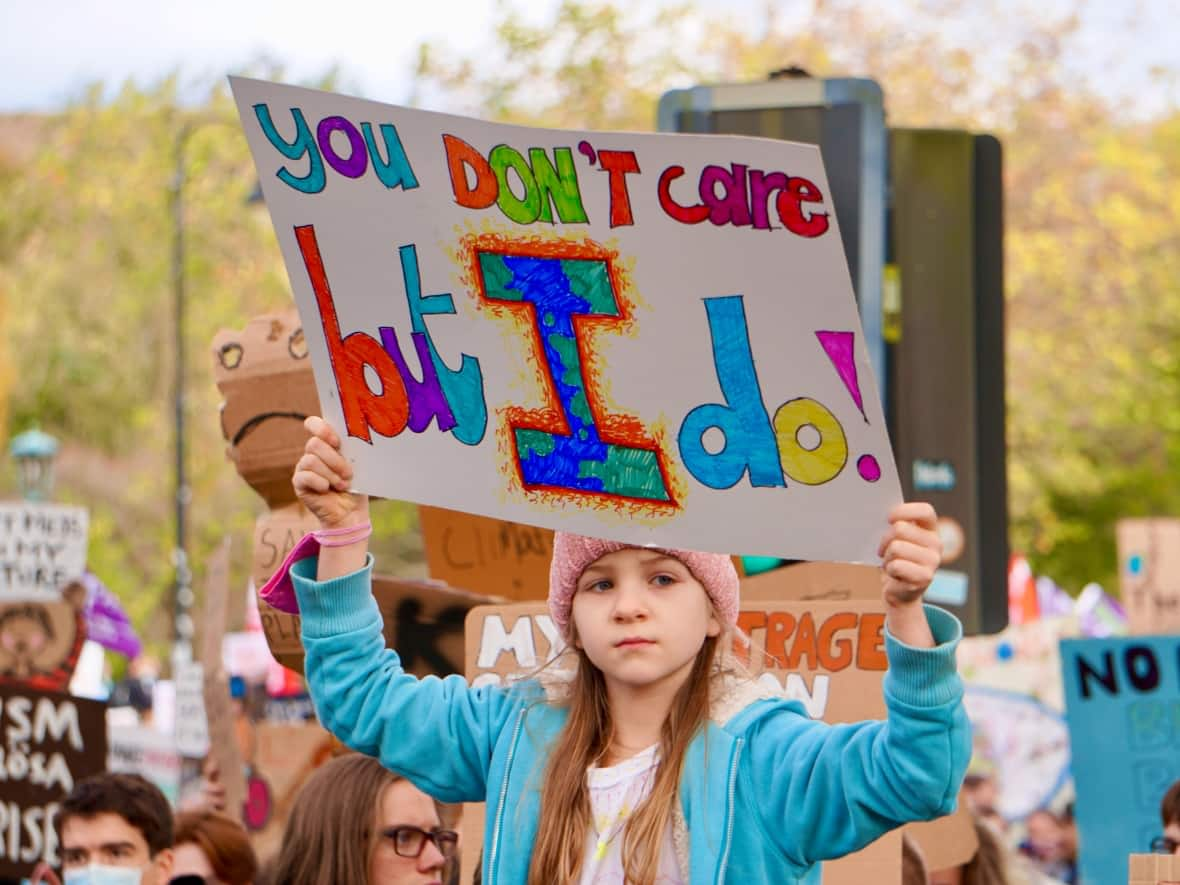 On Day Six of the COP26 climate summit in Scotland Friday, thousands of people took to the streets of Glasgow for a climate rally that was part of the Fridays for Future climate strike movement.  (Kyle Bakx/CBC - image credit)