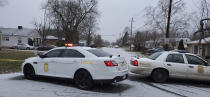 Indianapolis Metropolitan Police Department work the scene Sunday, Jan. 24, 2021 in Indianapolis where five people, including a pregnant woman, were shot to death early Sunday inside an Indianapolis home. The pregnant woman who was taken to an area hospital, both she and the unborn child died despite life-saving efforts. (Justin L. Mack/The Indianapolis Star via AP)